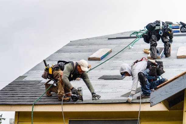 Professional Storm Damage Roof Repair technician working in West Harrison, NY